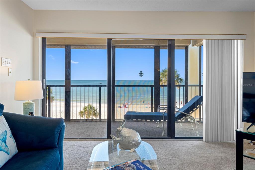 15000 Gulf Boulevard, Unit 408 Madeira Beach, FL 33708 - Photo 15 of 35 a living room with furniture and a window