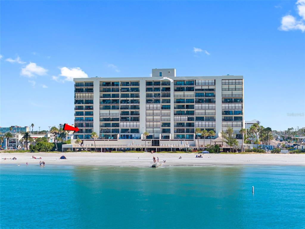 15000 Gulf Boulevard, Unit 408 Madeira Beach, FL 33708 - Photo 34 of 35 a front view of building with yard and street view
