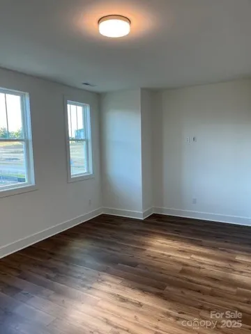 a bathroom with a double vanity sink a and a mirror