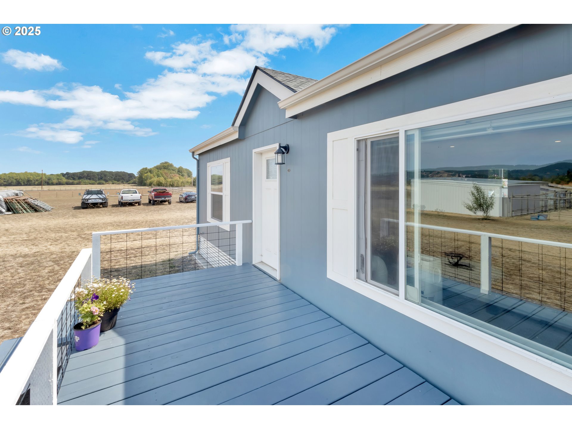 24550 Southwest Red Prairie Road Sheridan, OR 97378 - Photo 22 of 33 a view of a house with wooden floor