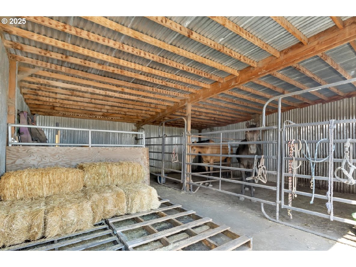 24550 Southwest Red Prairie Road Sheridan, OR 97378 - Photo 28 of 33 a view of a room with wooden floor