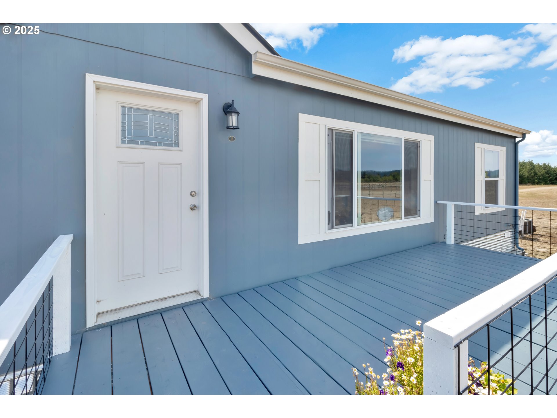 24550 Southwest Red Prairie Road Sheridan, OR 97378 - Photo 6 of 33 a view of outdoor space and wooden floor