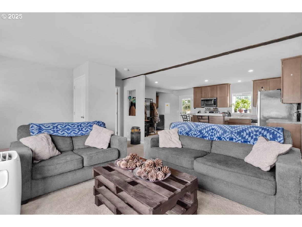 24550 Southwest Red Prairie Road Sheridan, OR 97378 - Photo 10 of 33 a living room with furniture and kitchen view