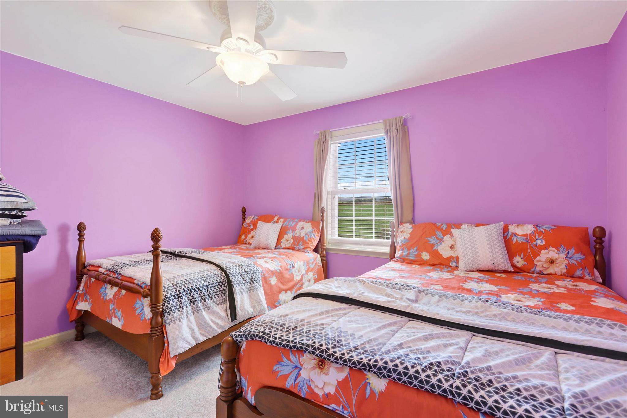 1109 Baltimore Road Shippensburg, PA 17257 - Photo 23 of 32 a bedroom with three beds and a chandelier