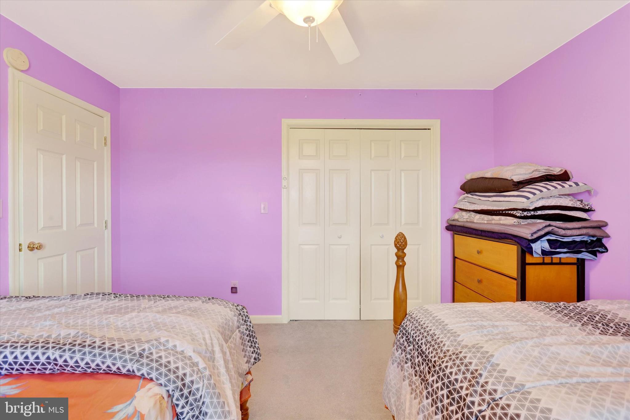 1109 Baltimore Road Shippensburg, PA 17257 - Photo 24 of 32 a bedroom with a bed and a mirror