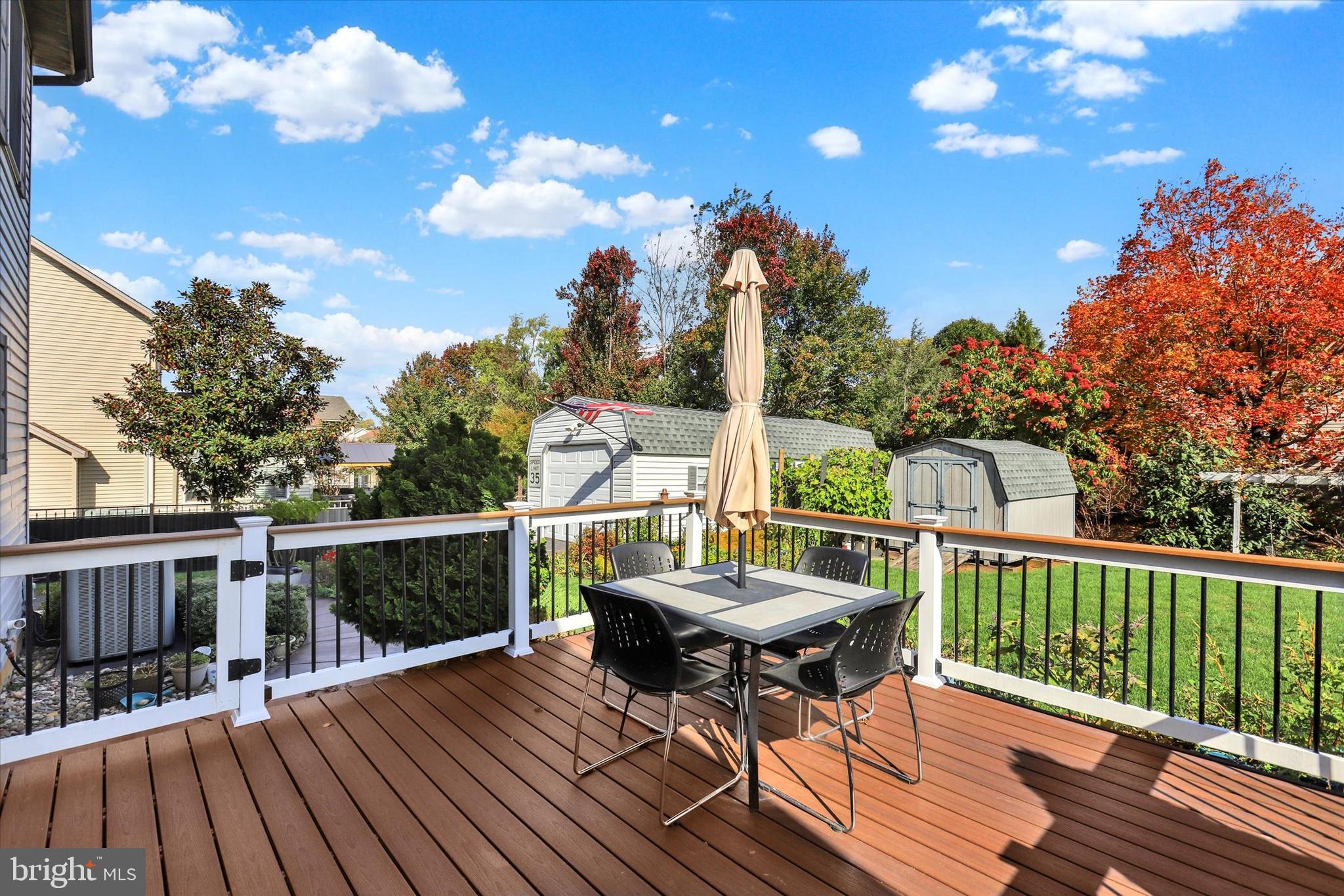 1109 Baltimore Road Shippensburg, PA 17257 - Photo 25 of 32 a balcony with wooden floor table and chairs