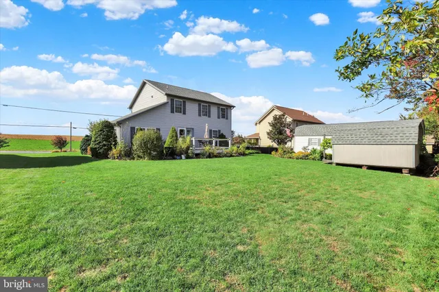 a front view of house with garden