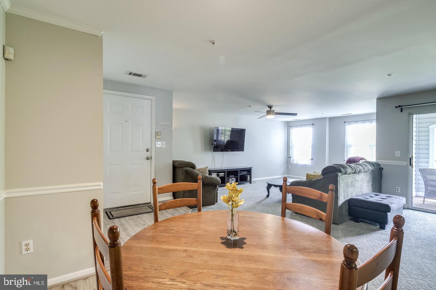 40 Greystone Court, Unit G Annapolis, MD 21403 - Photo 12 of 37 a living room with furniture and a flat screen tv