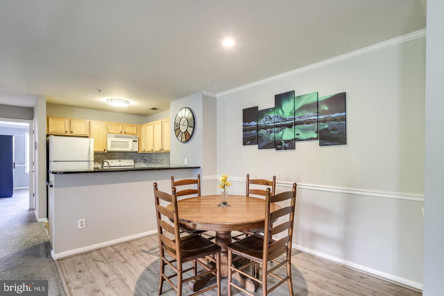 40 Greystone Court, Unit G Annapolis, MD 21403 - Photo 10 of 37 a dining room with furniture and window
