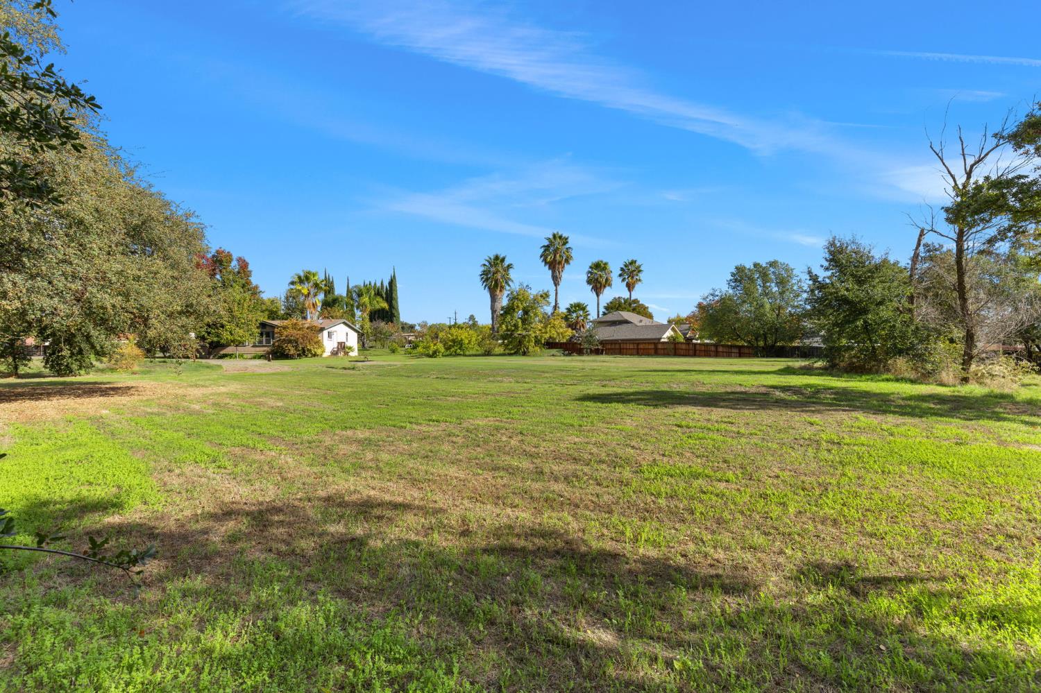 0 Myrtle Sacramento, CA 95841 - Photo 16 of 28 a view of a field with tree in the background