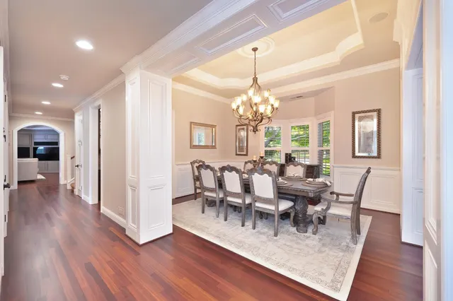 a kitchen with stainless steel appliances granite countertop a stove and a refrigerator