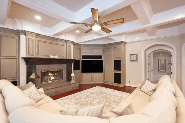 a spacious bathroom with a granite countertop tub shower and sink