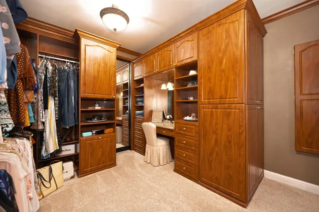 a living room with a flat screen tv and a table