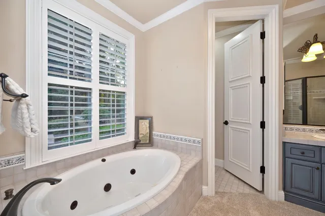 a view of washer and dryer with wooden floor