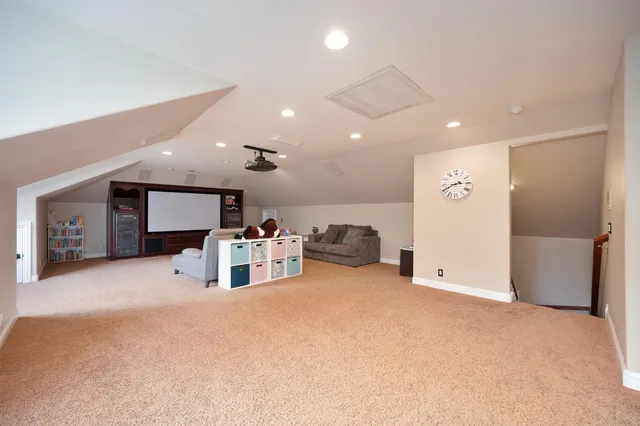 a front view of house with yard outdoor seating and barbeque oven