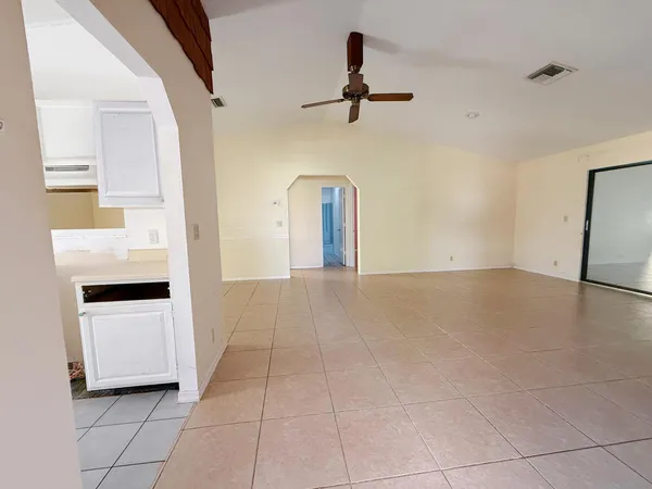 a view of a kitchen with a sink and dishwasher