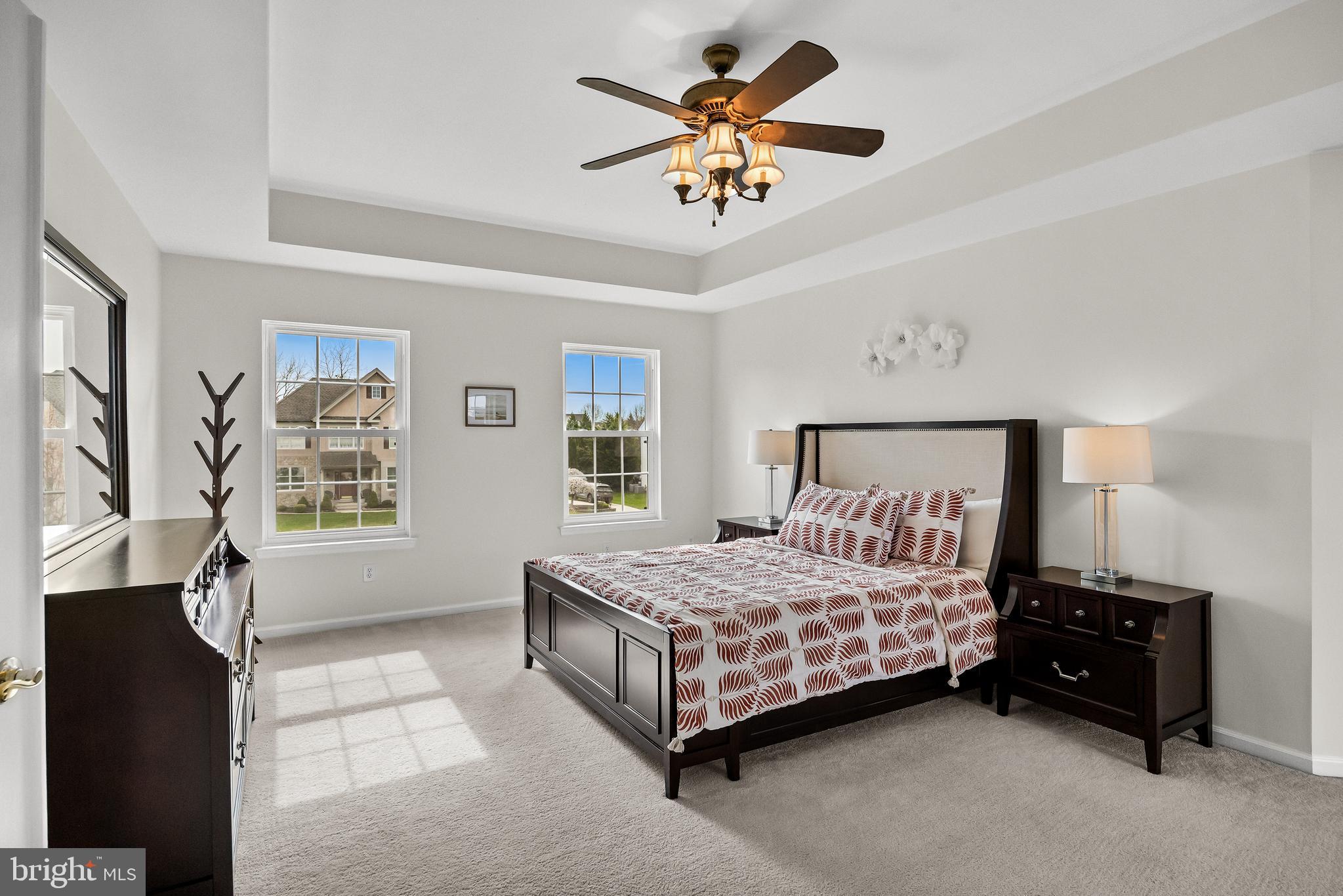 5 Periwinkle Place Lumberton, NJ 08048 - Photo 32 of 61 a bedroom with a bed and a chandelier