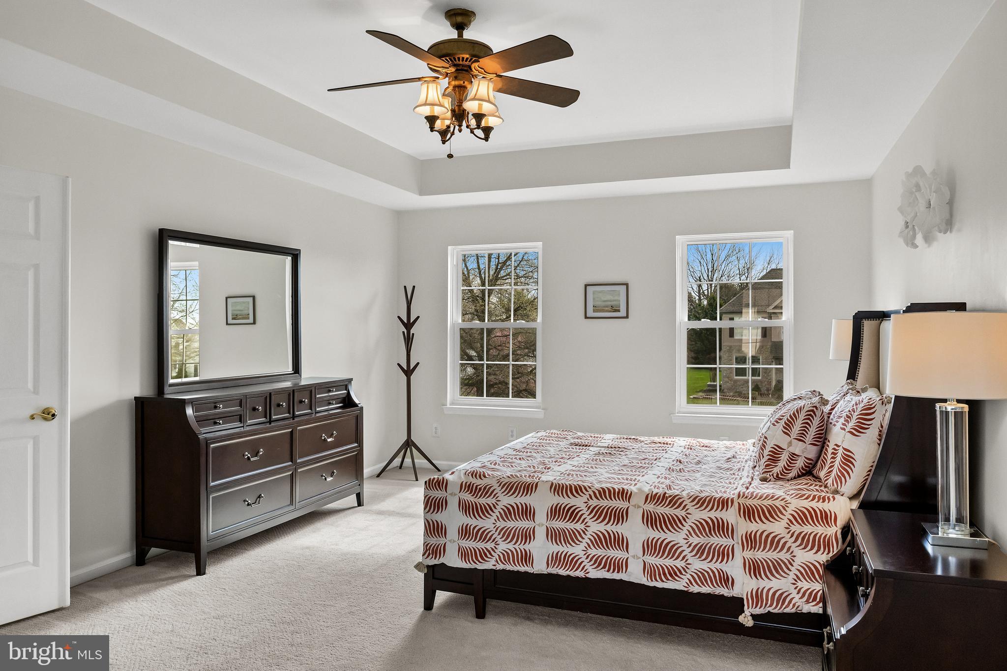 5 Periwinkle Place Lumberton, NJ 08048 - Photo 33 of 61 a bedroom with a bed and dresser with mirror