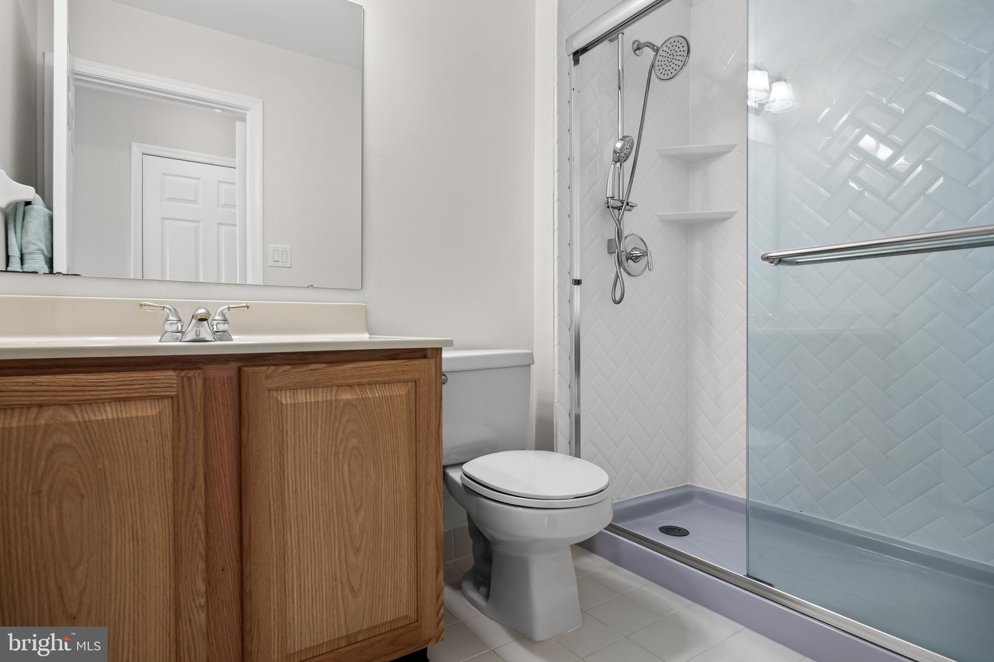 5 Periwinkle Place Lumberton, NJ 08048 - Photo 43 of 61 a bathroom with a sink a toilet and shower