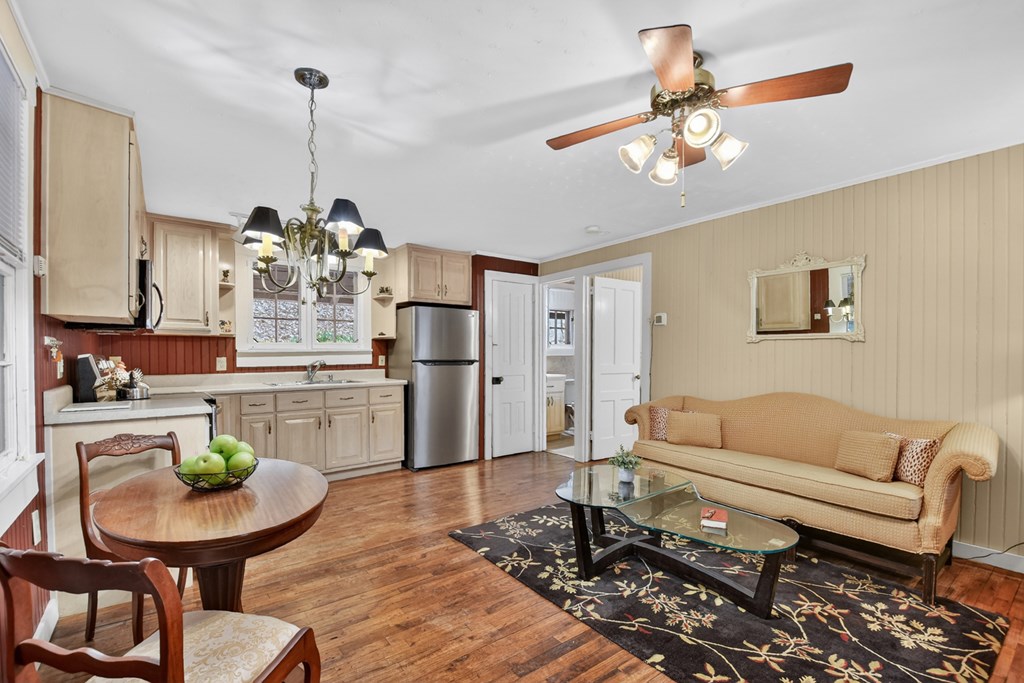 190 Village Road Murphy, NC 28906 - Photo 33 of 50 a living room with stainless steel appliances kitchen island granite countertop furniture and a dining table
