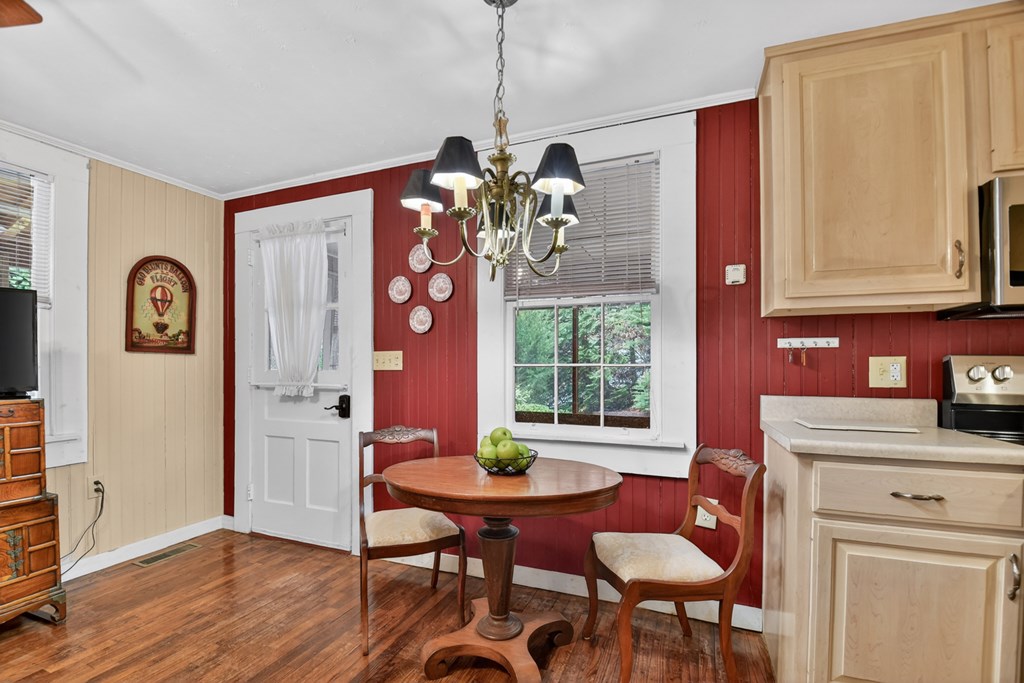 190 Village Road Murphy, NC 28906 - Photo 35 of 50 a view of a dining room with furniture window and wooden floor