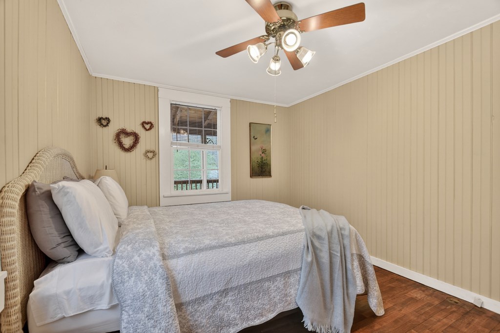 190 Village Road Murphy, NC 28906 - Photo 41 of 50 a bedroom with a bed furniture and a window