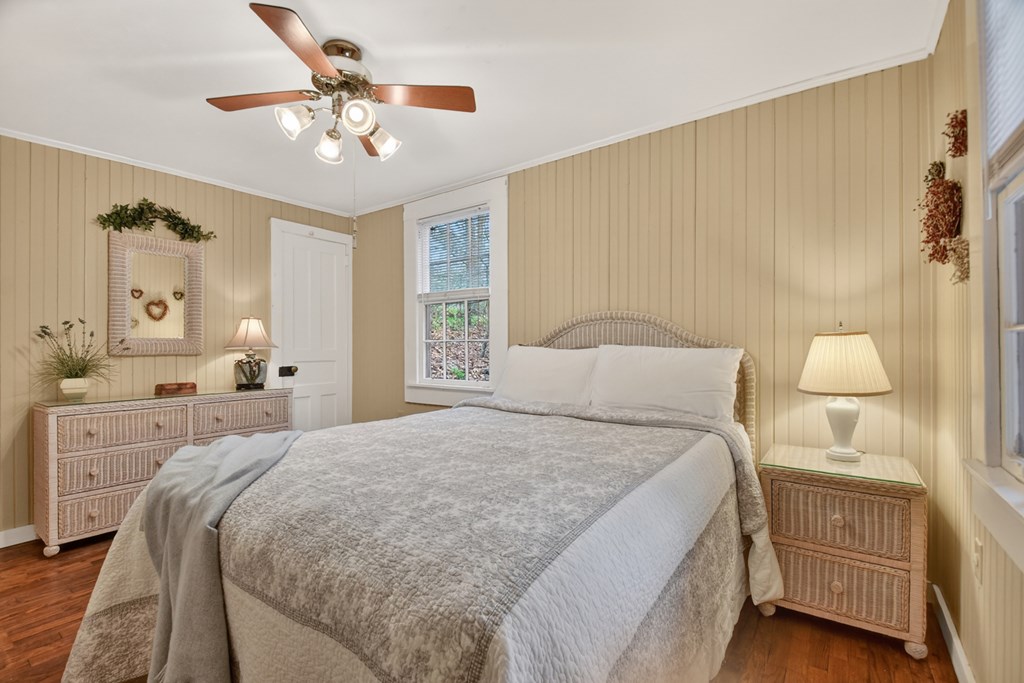 190 Village Road Murphy, NC 28906 - Photo 42 of 50 a bedroom with a bed and a chandelier