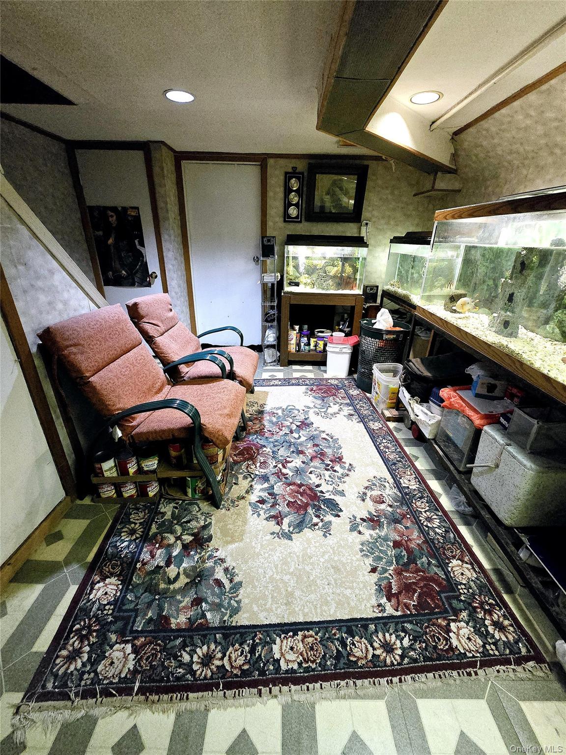 85-09 Sutter Avenue Queens, NY 11417 - Photo 10 of 12 Sitting room featuring tile patterned floors and recessed lighting