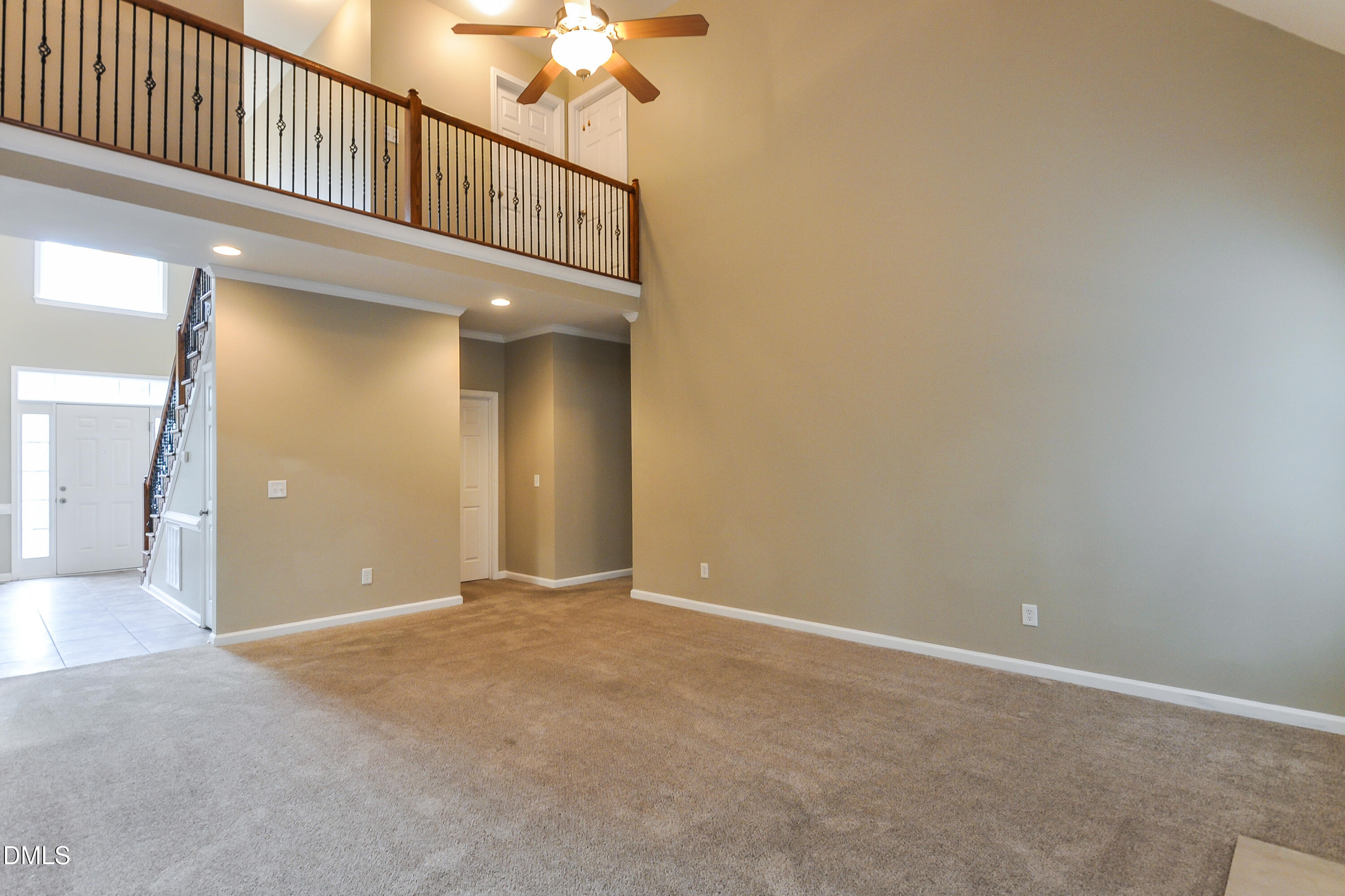88 Meadow Loop Drive Clayton, NC 27527 - Photo 2 of 15 a view of an entryway with a hallway