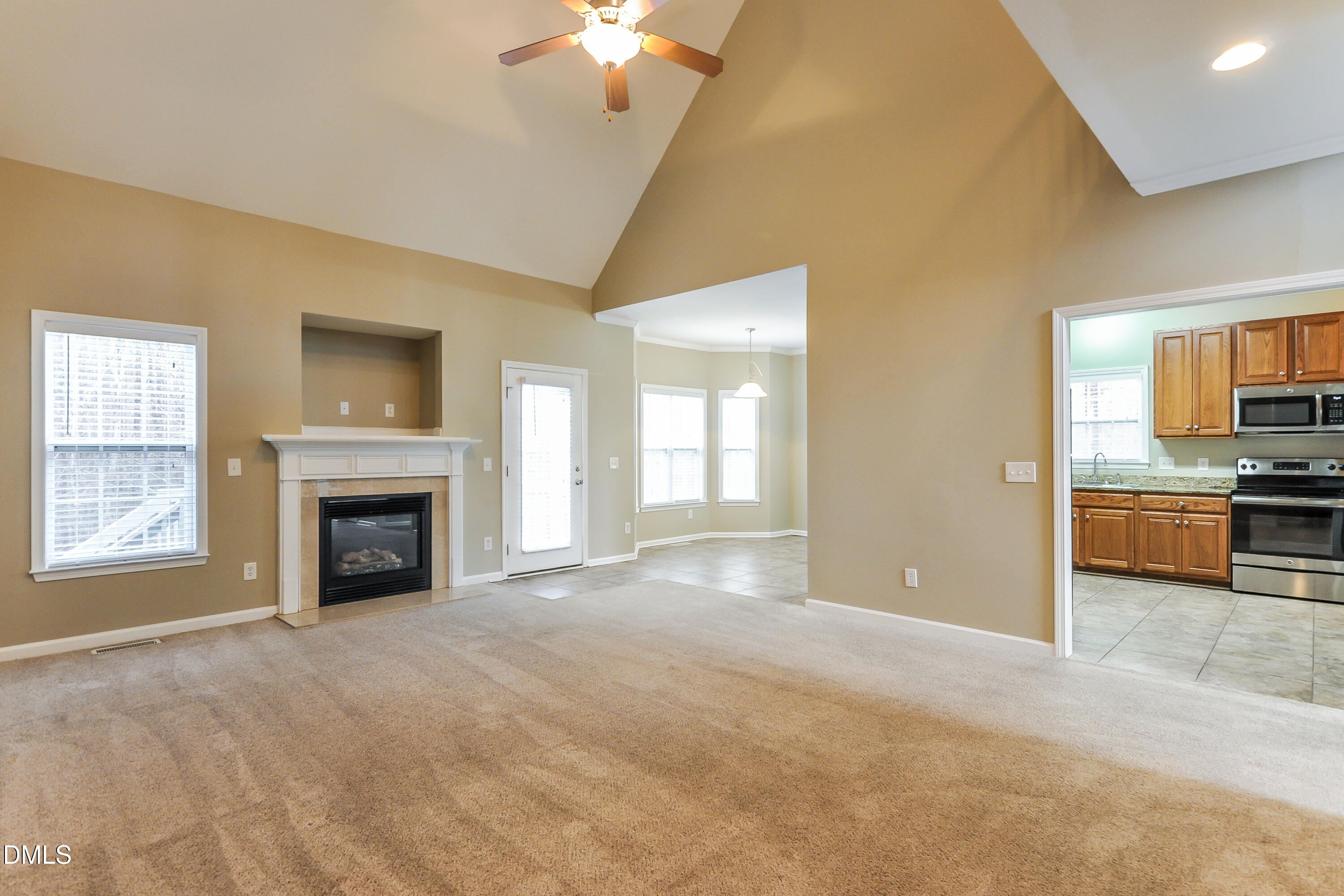 88 Meadow Loop Drive Clayton, NC 27527 - Photo 3 of 15 a view of a livingroom with a fireplace