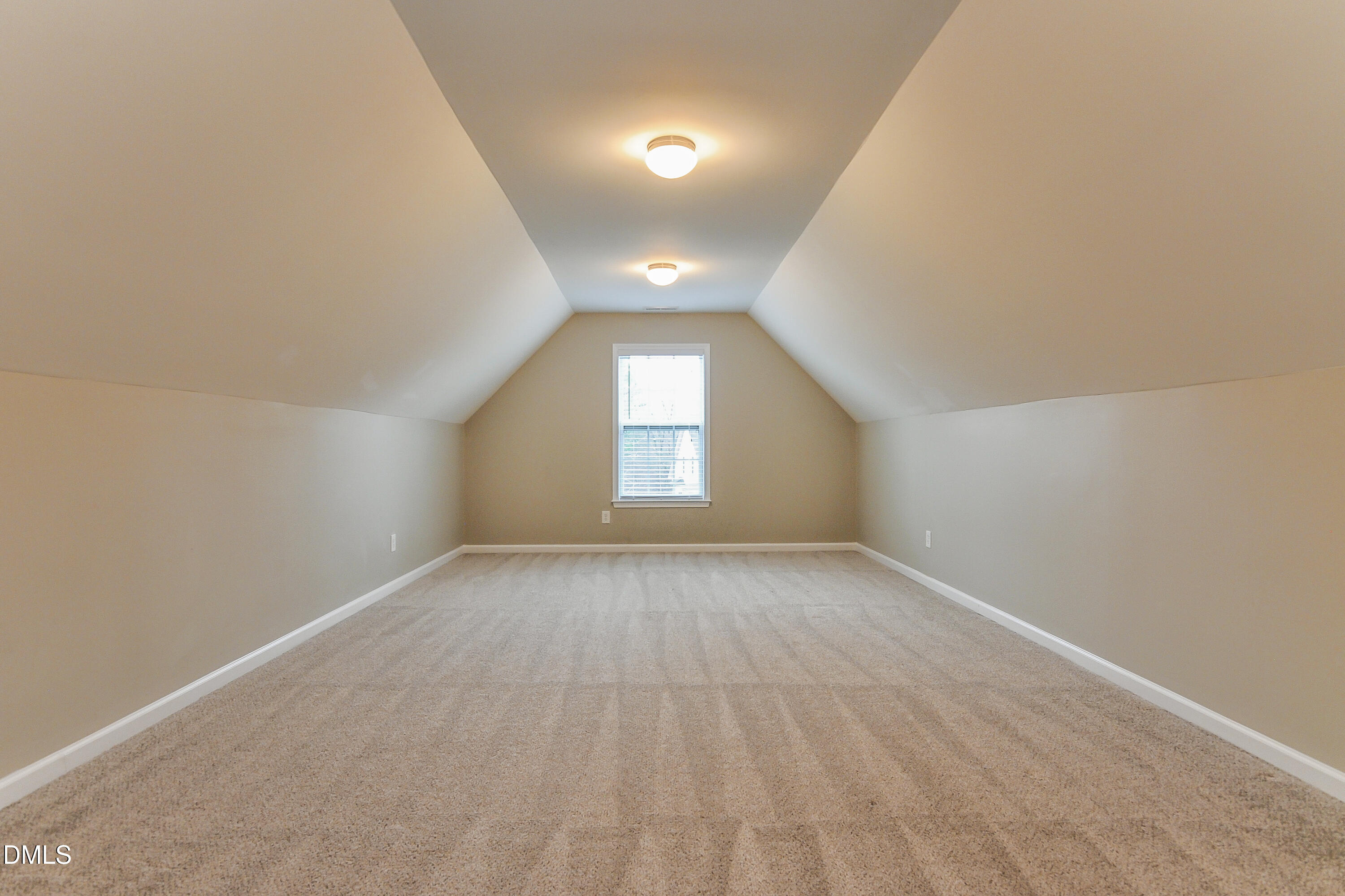88 Meadow Loop Drive Clayton, NC 27527 - Photo 7 of 15 an empty room with a empty space and windows