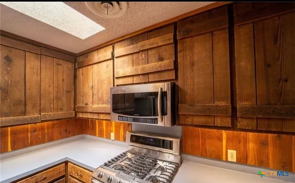 a view of a living room with a flat screen tv