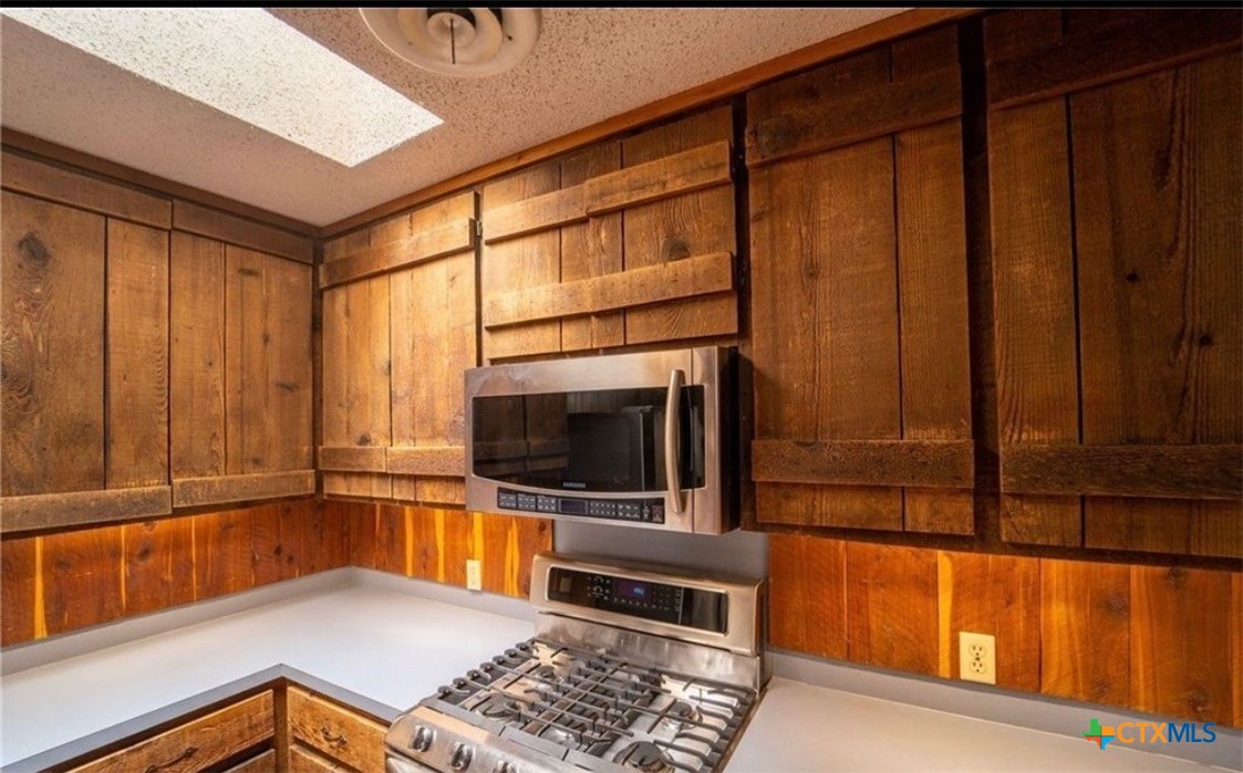 112 Stratford Street Victoria, TX 77905 - Photo 7 of 13 a view of a living room with a flat screen tv