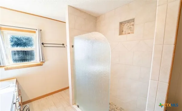 a bathroom with a window