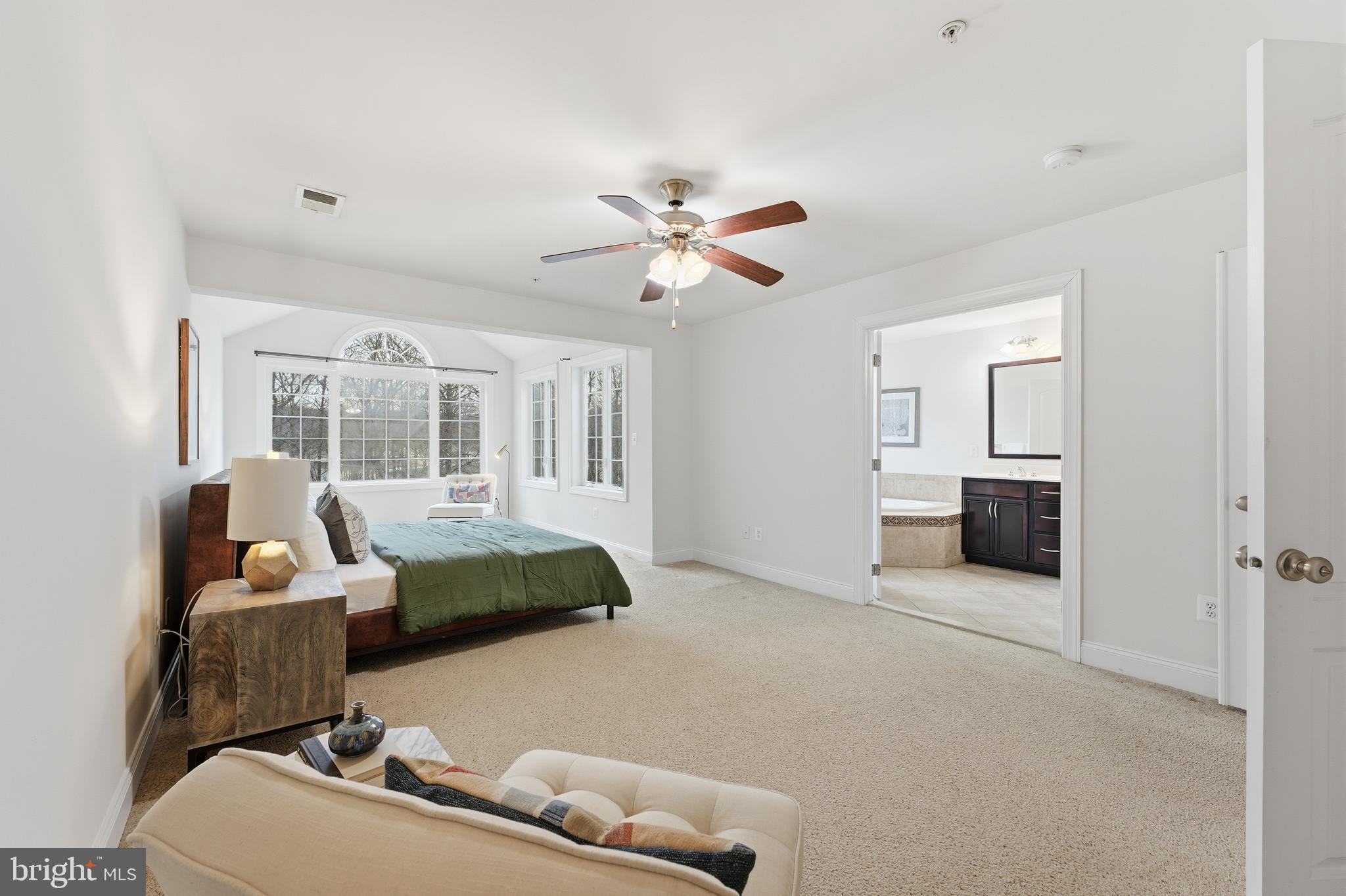 2284 Brimstone Place Hanover, MD 21076 - Photo 13 of 37 a bedroom with furniture and large windows