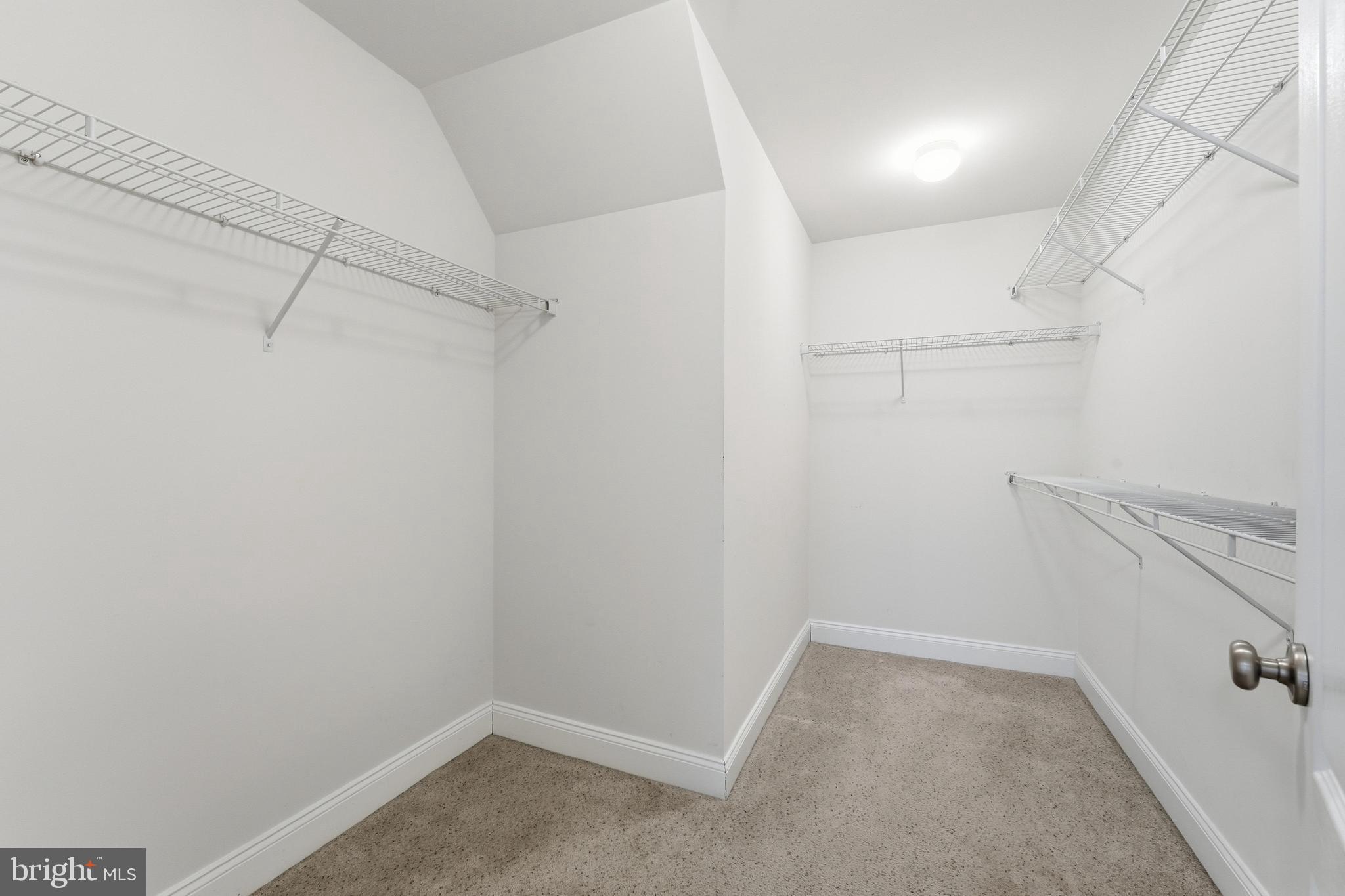 2284 Brimstone Place Hanover, MD 21076 - Photo 16 of 37 a view of a room with racks on the wall