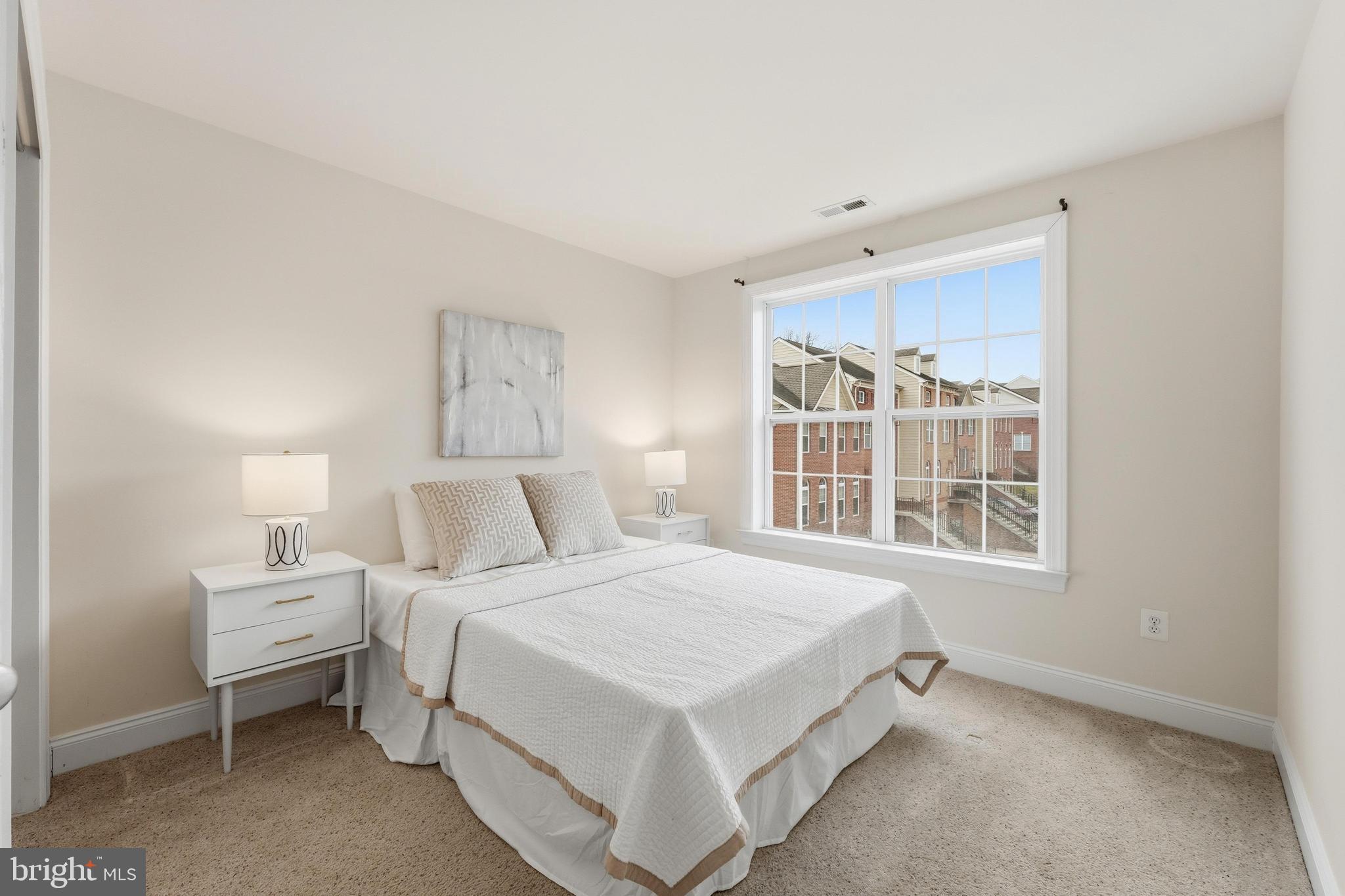 2284 Brimstone Place Hanover, MD 21076 - Photo 18 of 37 a large white bed in a white room