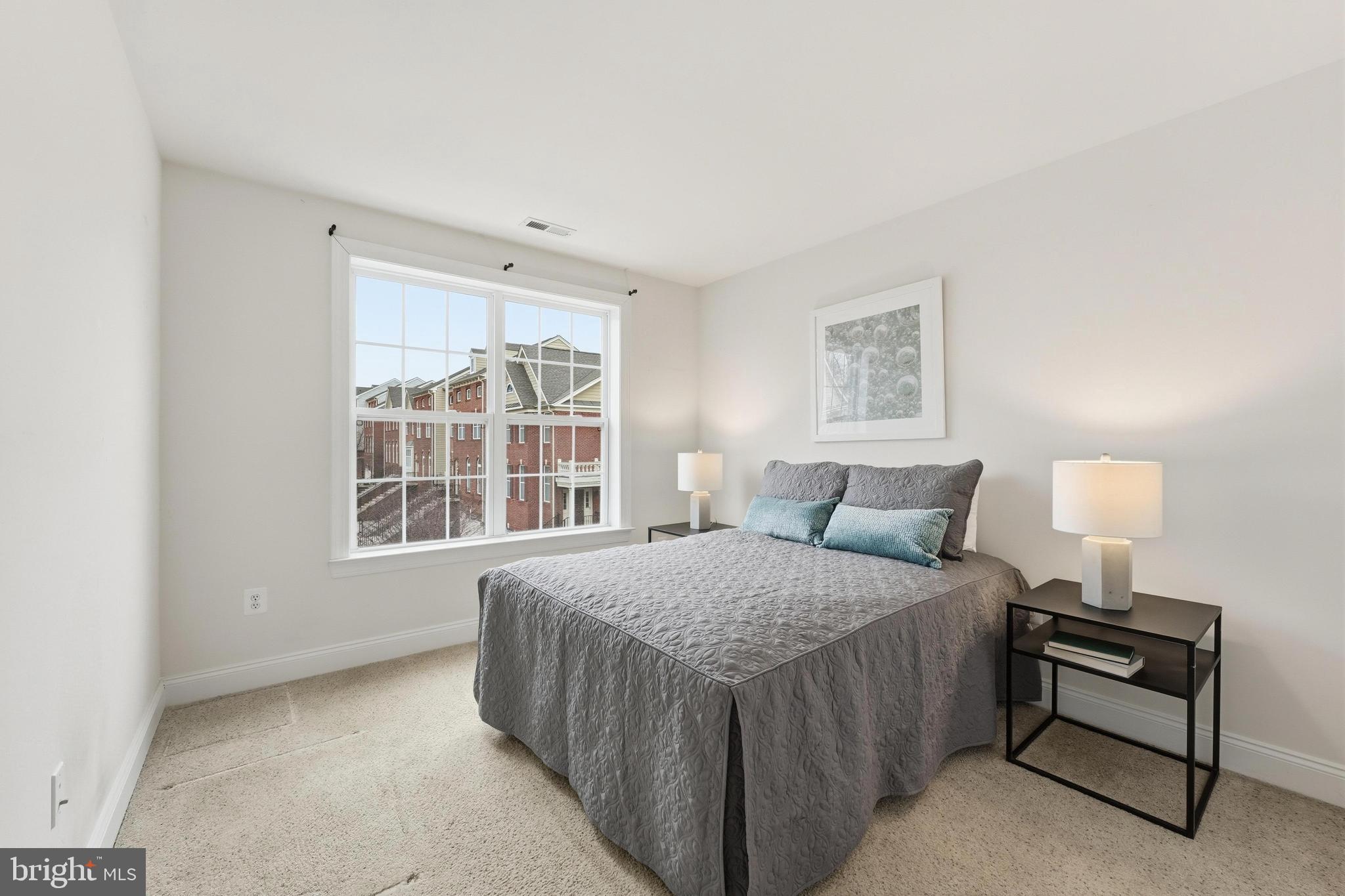 2284 Brimstone Place Hanover, MD 21076 - Photo 20 of 37 a bedroom with a bed and a window