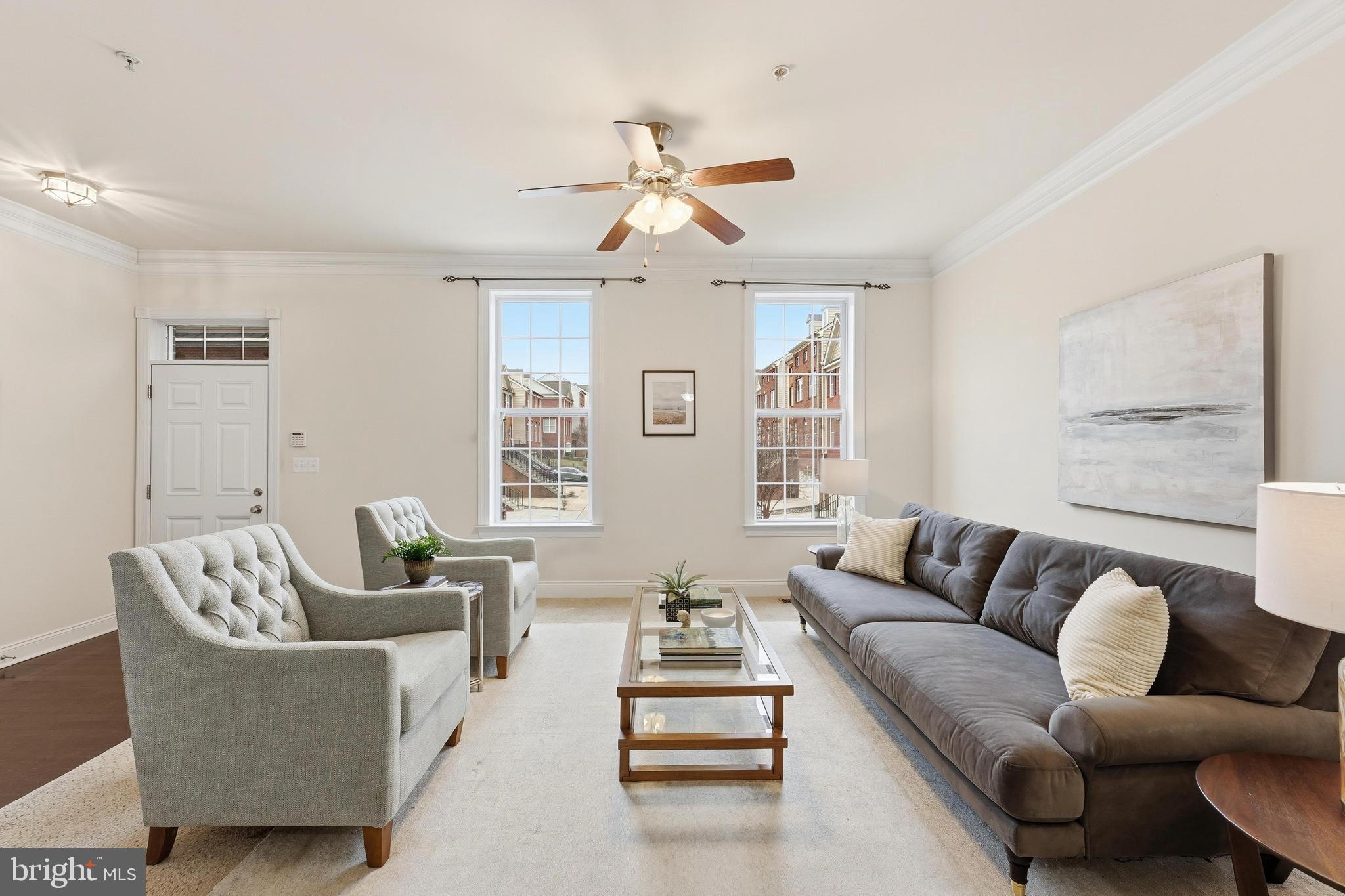 2284 Brimstone Place Hanover, MD 21076 - Photo 2 of 37 a living room with furniture and a large window