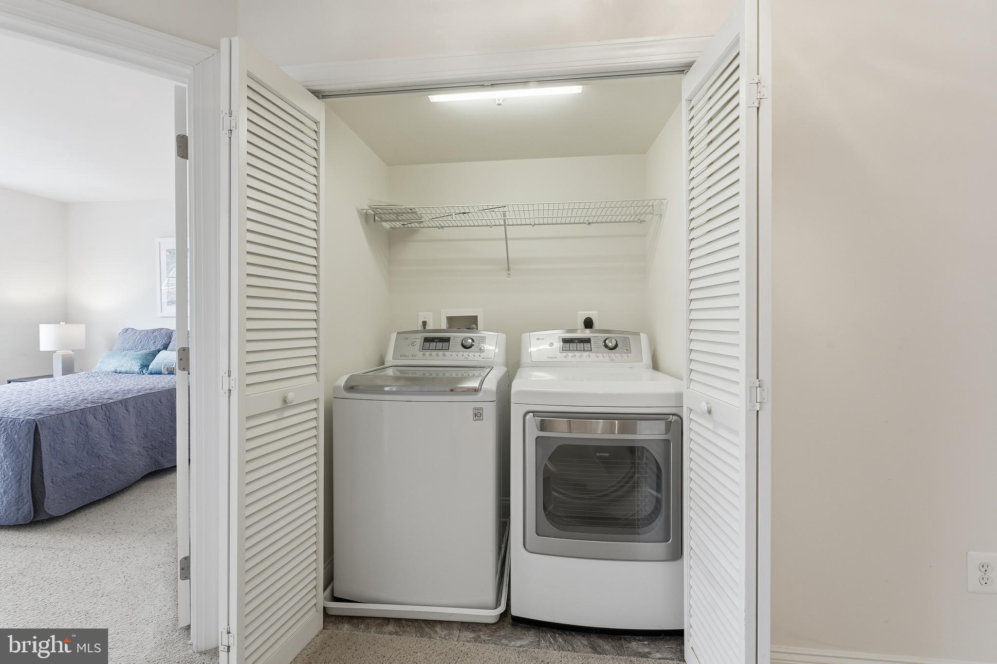 2284 Brimstone Place Hanover, MD 21076 - Photo 23 of 37 a utility room with dryer and washer