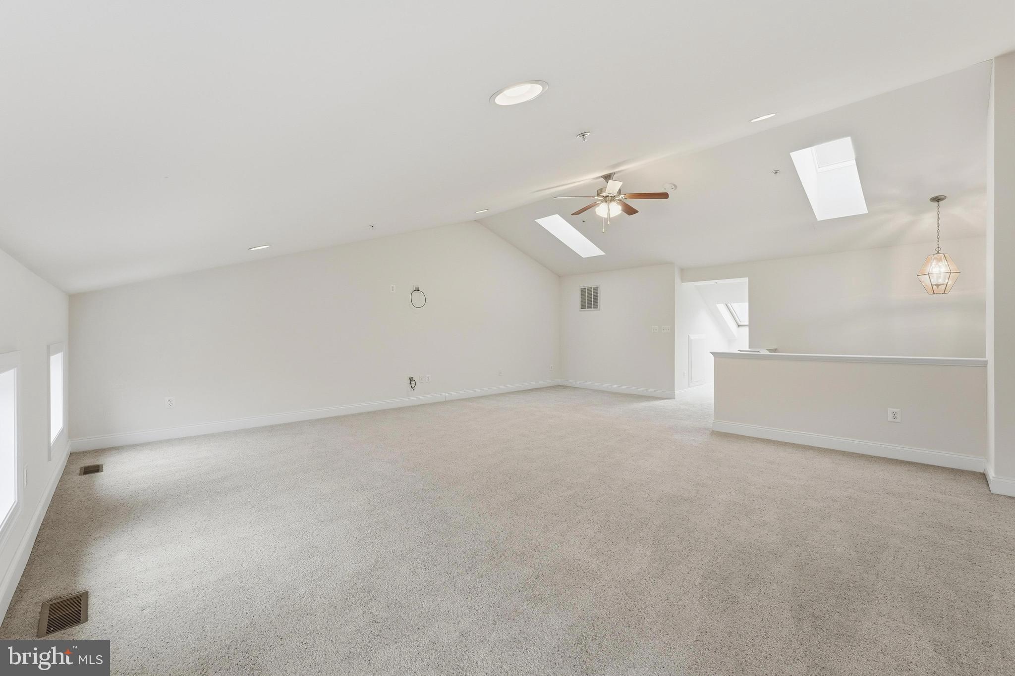 2284 Brimstone Place Hanover, MD 21076 - Photo 27 of 37 an empty room with a empty space and windows