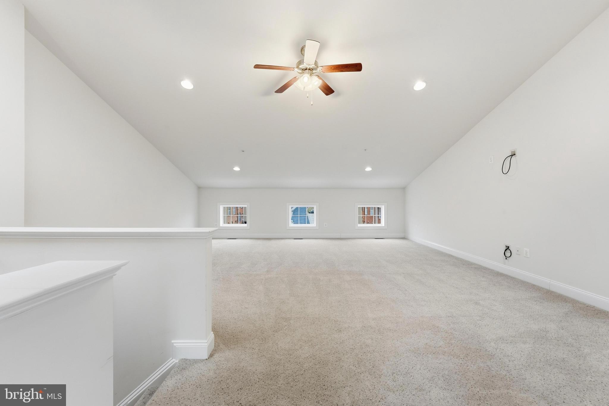 2284 Brimstone Place Hanover, MD 21076 - Photo 29 of 37 a view of a livingroom with a ceiling fan and window