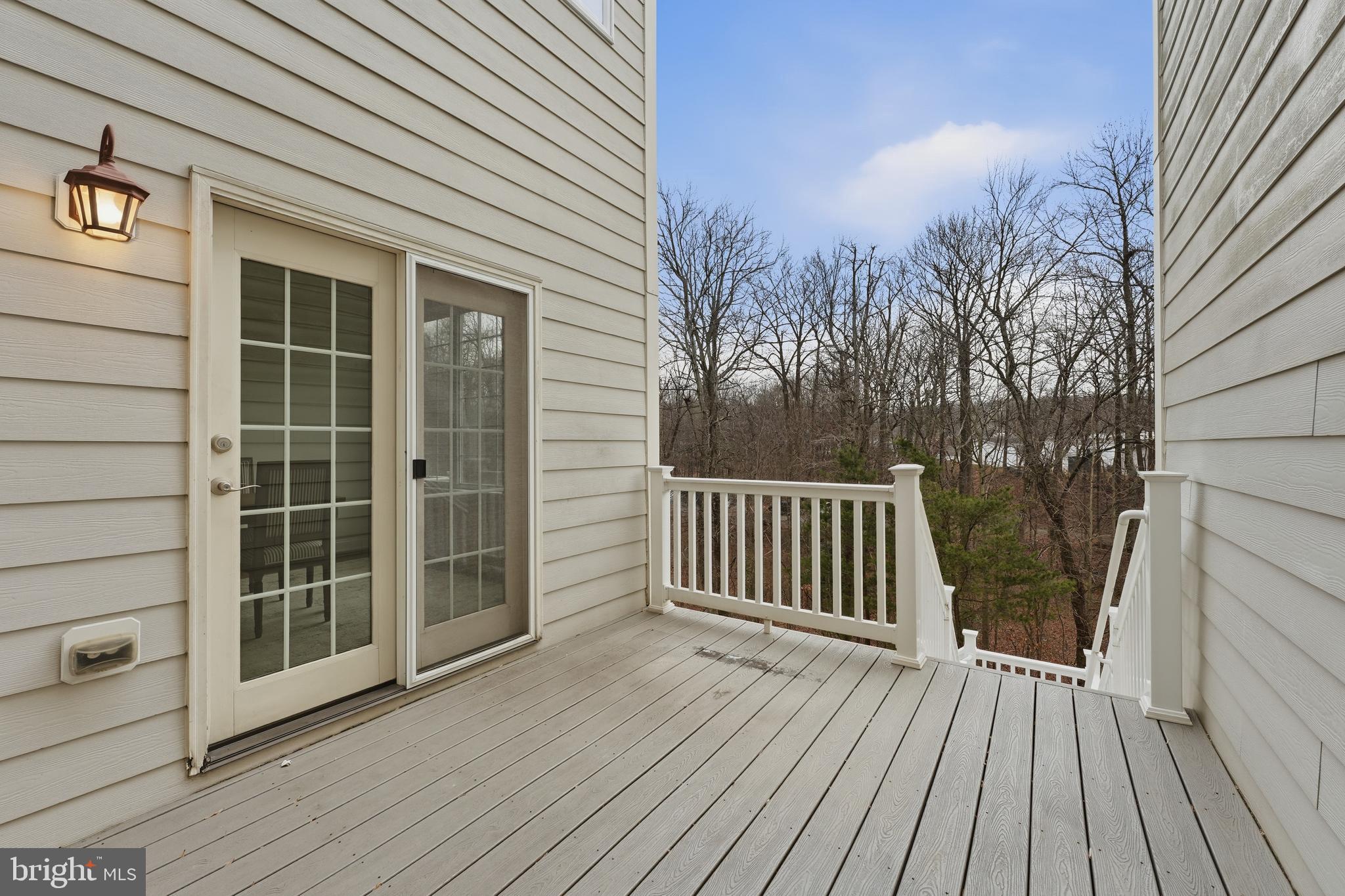 2284 Brimstone Place Hanover, MD 21076 - Photo 30 of 37 a view of backyard with a deck