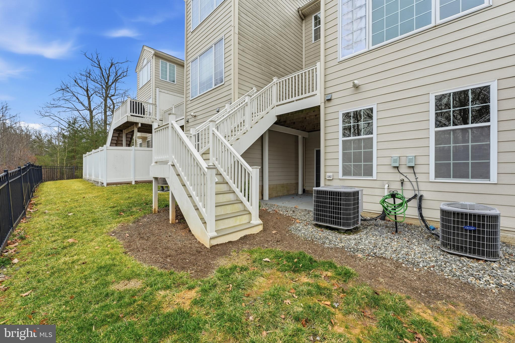 2284 Brimstone Place Hanover, MD 21076 - Photo 33 of 37 a view of a house with backyard and porch