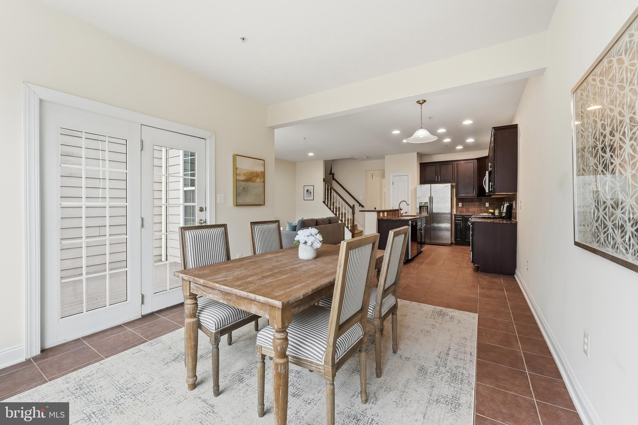 2284 Brimstone Place Hanover, MD 21076 - Photo 10 of 37 a dining room with furniture and window