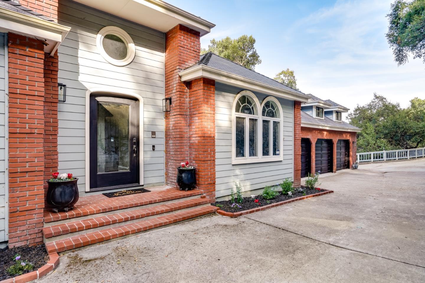 18565 Overlook Road Monte Sereno, CA 95030 - Photo 2 of 72 a front view of a house with a garage