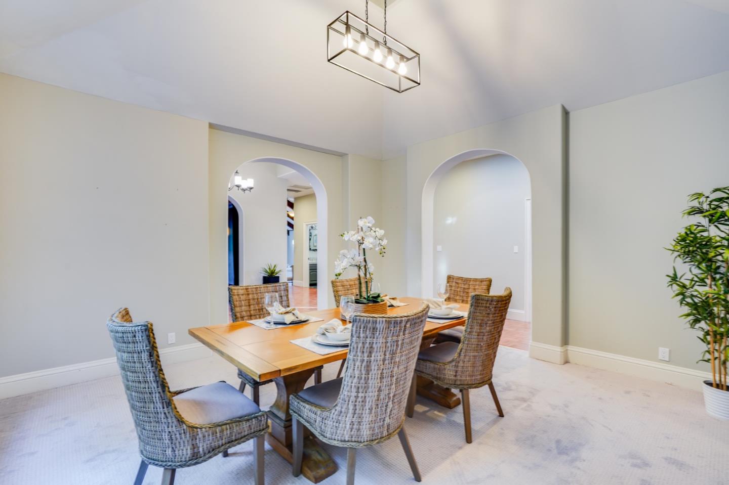 18565 Overlook Road Monte Sereno, CA 95030 - Photo 14 of 72 a dining room with a wooden table and chairs