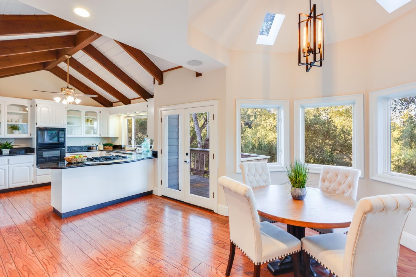 18565 Overlook Road Monte Sereno, CA 95030 - Photo 19 of 72 a living room with stainless steel appliances kitchen island granite countertop furniture and a kitchen view