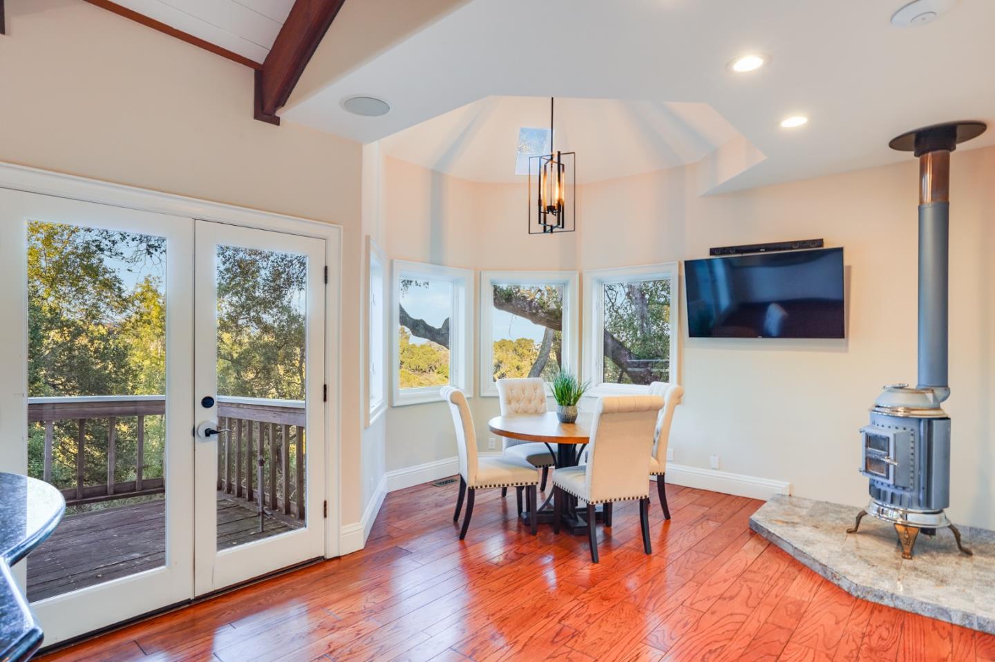 18565 Overlook Road Monte Sereno, CA 95030 - Photo 20 of 72 a view of a dining room with furniture window and wooden floor