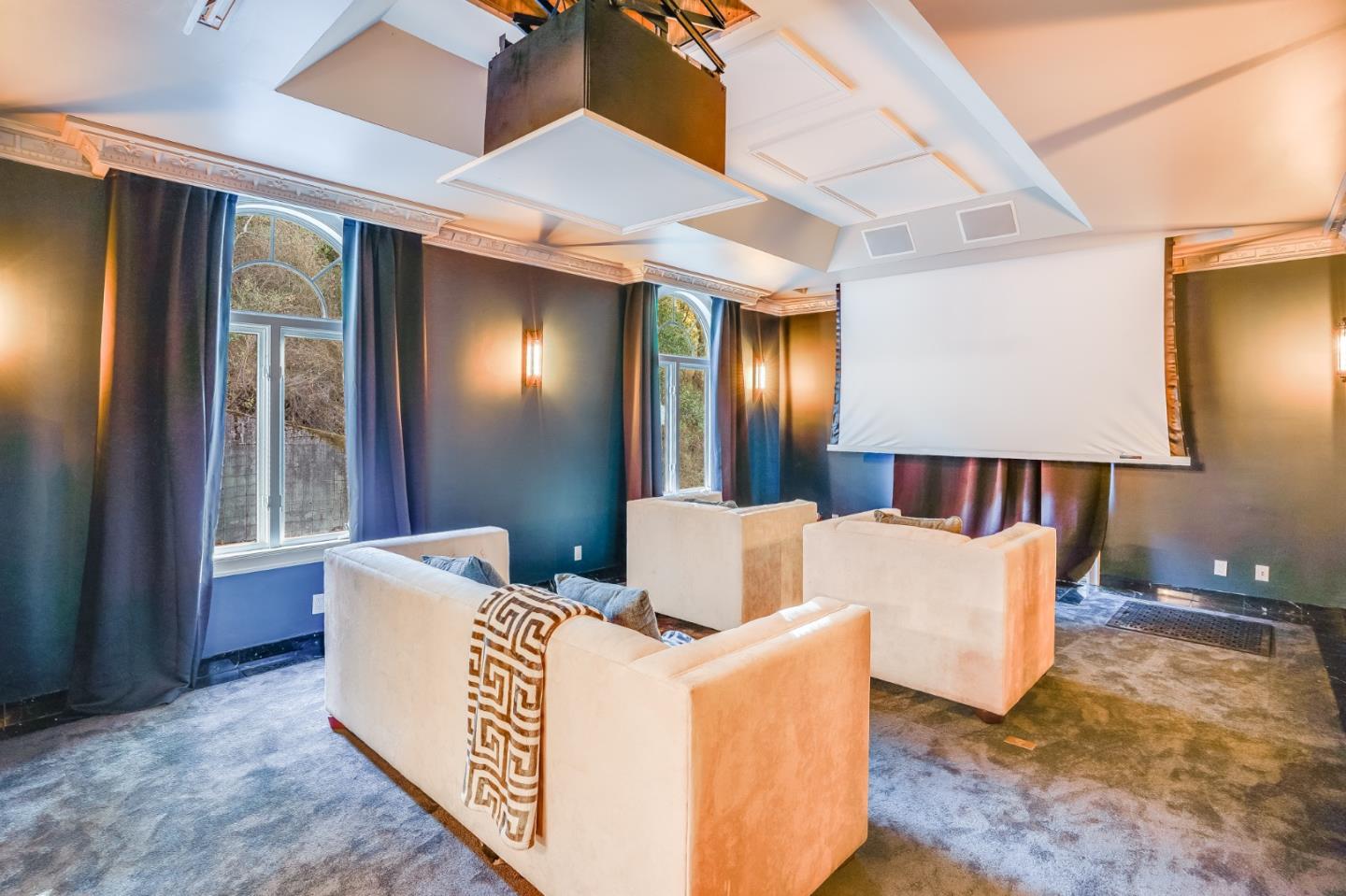 18565 Overlook Road Monte Sereno, CA 95030 - Photo 24 of 72 a living room with furniture and a lamp